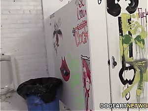 Candice Dare smashes 2 black lollipops In A restroom